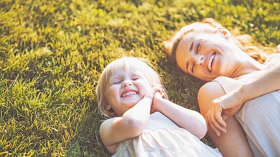 Mother and child in a meadow
