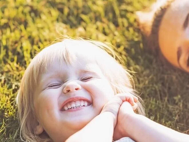 Mother and child in a meadow